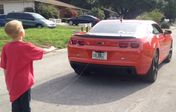 Video: Petrolhead Dad uses muscle car to yank out tooth