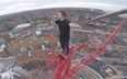 Video: Free climber scales this huge crane…to have a protein shake