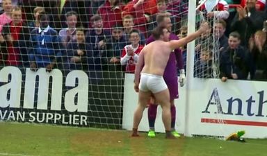 Video: Football streaker runs length of pitch for goalie selfie…then falls over