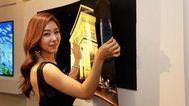 LG launch new paper-thin TV that can be mounted on a wall with magnets