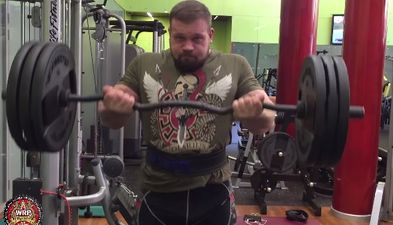 Russian monster bicep curls a terrifying 132kg bar for reps (Video)