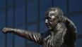 Liverpool fan paints face as part of Shankly statue costume