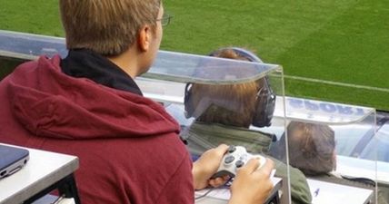 Why the hell did this guy have an Xbox controller in crowd at Arsenal vs Newcastle?