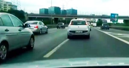 Maniac Audi TT driver dodges through traffic like it’s a computer game (Video)