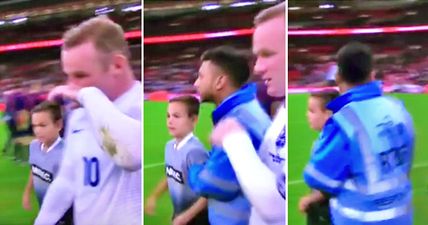 Young kid gets within touching distance of Rooney before being ushered away (Video)