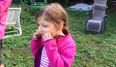 Watch this girl have a loose tooth pulled out by a drone