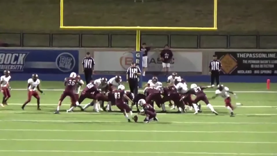 American football kicker hits ref in the face with a kick…and the ball still goes over (Video)