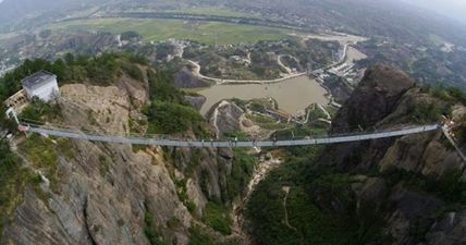 China has officially opened one of the most terrifying glass bridges in the world (Video)