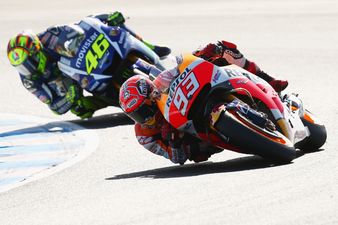 MotoGP legend Valentino Rossi kicks rival Marc Marquez off his bike at high speed (Video)