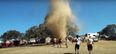 Tornado forms at Australian music festival, fans go wild and start dancing around it (Video)