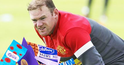 Rooney spotted stuffing his face with sweets during West Ham game (Video)