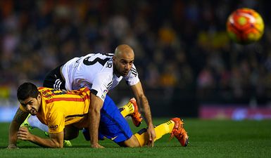 Valencia player shows off wounds from Luis Suarez stamping incident (Pic)