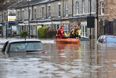 Flood victims slapped with parking tickets and battling bogus callers