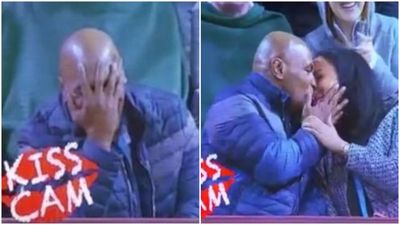 VIDEO: Mike Tyson caught on Kiss Cam snogging his missus