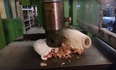 Don’t start your day before you’ve watched a hydraulic press crush a bowling ball and pin