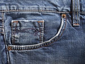 This is why there are little buttons on your jean pockets