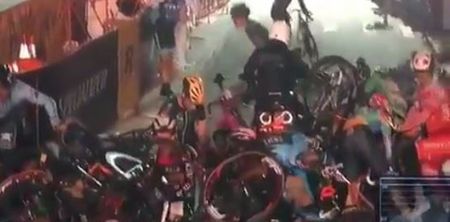 Watch as a stalled motorcycle causes a massive bicycle pile-up