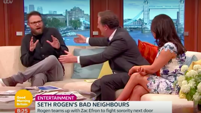 Watch Seth Rogan react as any reasonable human would to a Piers Morgan hug