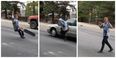 Skateboarder manages to avoid getting flattened by a car, but only just