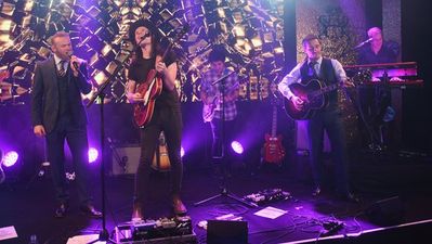 Gary Neville plays guitar as Wayne Rooney joins James Bay to sing ‘Hold Back The River’