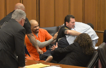 Heartbroken father makes lunge for daughter’s grinning murderer in court