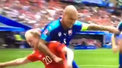 Wales fans livid as Skrtel’s elbow on Williams goes unpunished a yard from the official