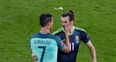 Cristiano Ronaldo and Gareth Bale embrace moments after the final whistle in Lyon