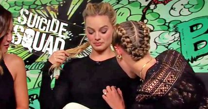 Cara Delevingne tries out her ‘nipple detector’ on Margot Robbie and we don’t know what to think