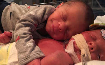 An image of a newborn hugging his sick brother has broken hearts everywhere