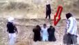 ISIS prisoner escapes execution and appears to kill his AK 47-wielding captors