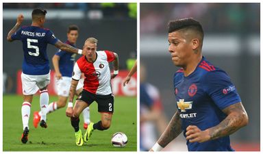 Delighted Manchester United fans celebrate the return of Marcos Rojo