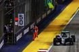 Terrified Singapore GP marshal is nearly run over as race restarts when he’s still on track