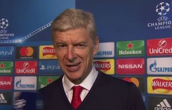 Arsene Wenger can’t help but smirk when asked if he’s the next England boss