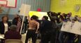 Topless protesters removed from polling station where Donald Trump is due to vote