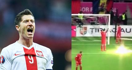 Watch the shocking moment a flare explodes dangerously close to Robert Lewandowski