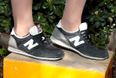 This is why New Balance trainers are being burned outside American shops