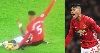 Marcos Rojo somehow escapes red with a lunge that Sergio Aguero would have been proud of