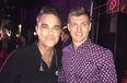 Good guy Robbie Williams delights adoring fan by stopping for photo