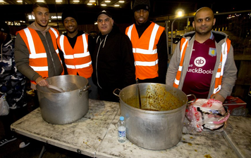 Aston Villa trio serve food to the homeless at Birmingham soup kitchen