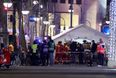 Suspect arrested after a truck crashes into crowds at a Berlin Christmas market