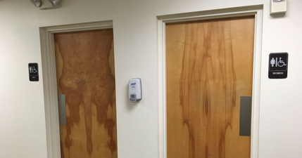 These bathroom doors are either deliberately very rude or accidentally hilarious