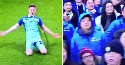 Rival fans mock Manchester City supporters for their celebration after John Stones’ goal