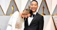 Something tells us that Chrissy Teigen was just a tad tired at the Oscars