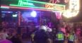 Main strip in Benidorm on lockdown as police in riot gear raid pubs and nightclubs