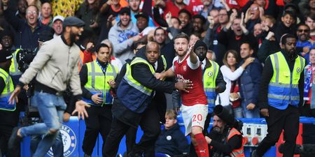 An Arsenal fan was kicked out of Stamford Bridge for running on the pitch to celebrate an offside goal