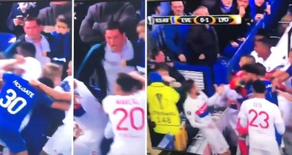 Everton fan holding a child tries to get involved in free-for-all with Lyon team