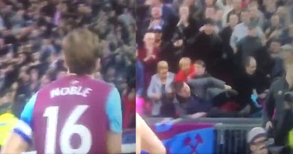 WATCH: West Ham fan takes a tumble as he attempts to catch Mark Noble’s shirt