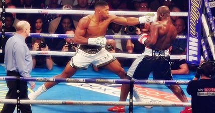 Anthony Joshua fights through injured nose to do what he always does