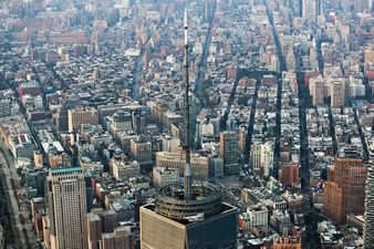 Suspect held as motorist reportedly drives vehicle on to New York cycle path and opens fire