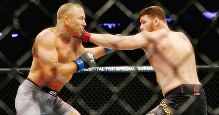 Michael Bisping choked unconscious as Georges St-Pierre claims middleweight gold